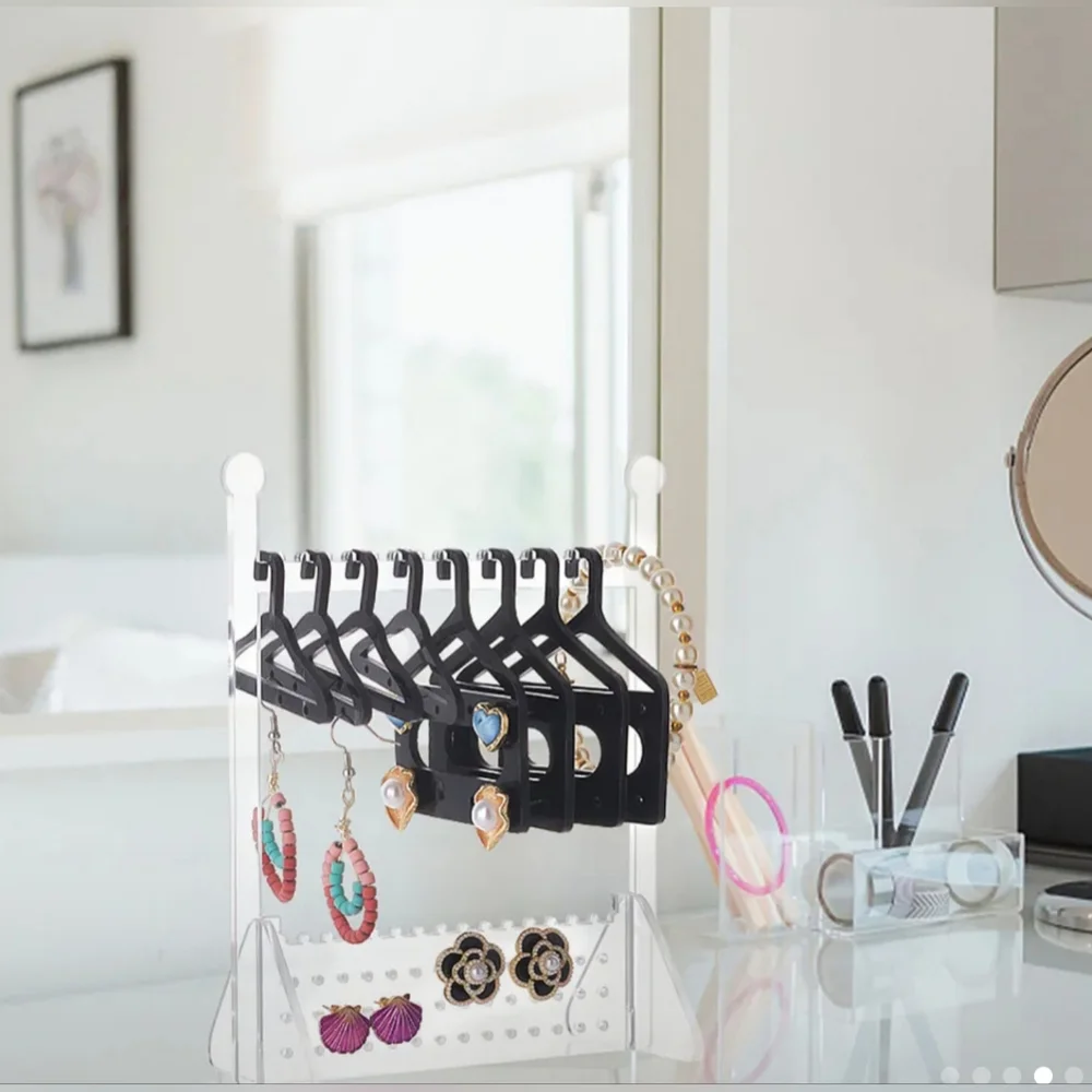 - Acrylic Black And Transparent Hanger Organizer For Jewelry. 8 Hangers